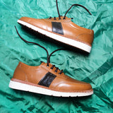polo en cuir marron